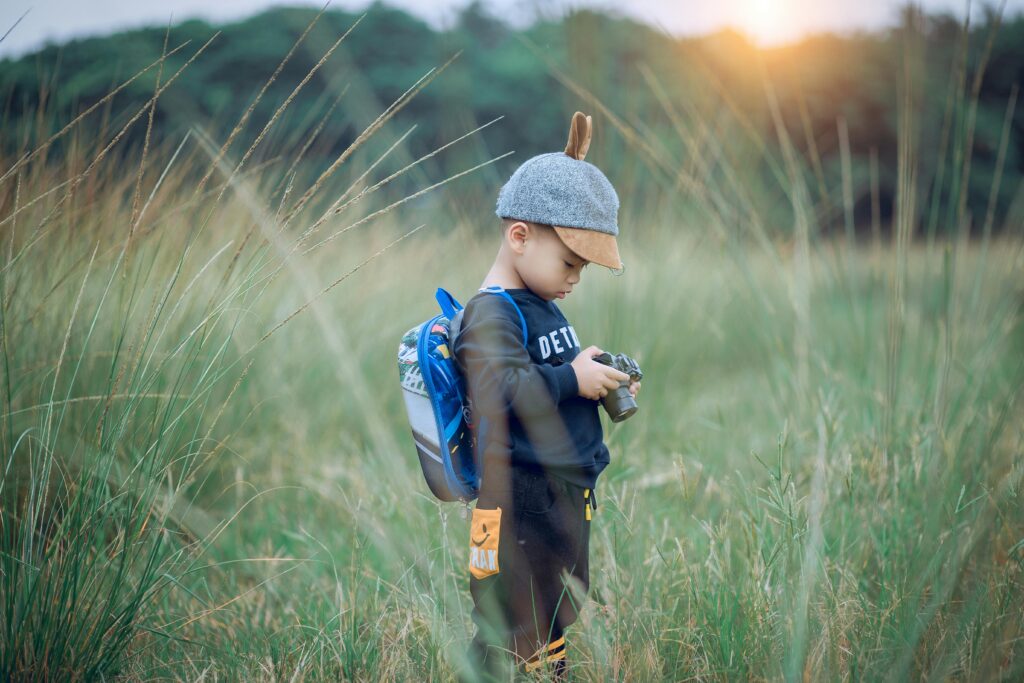 Toddler Holding Camera